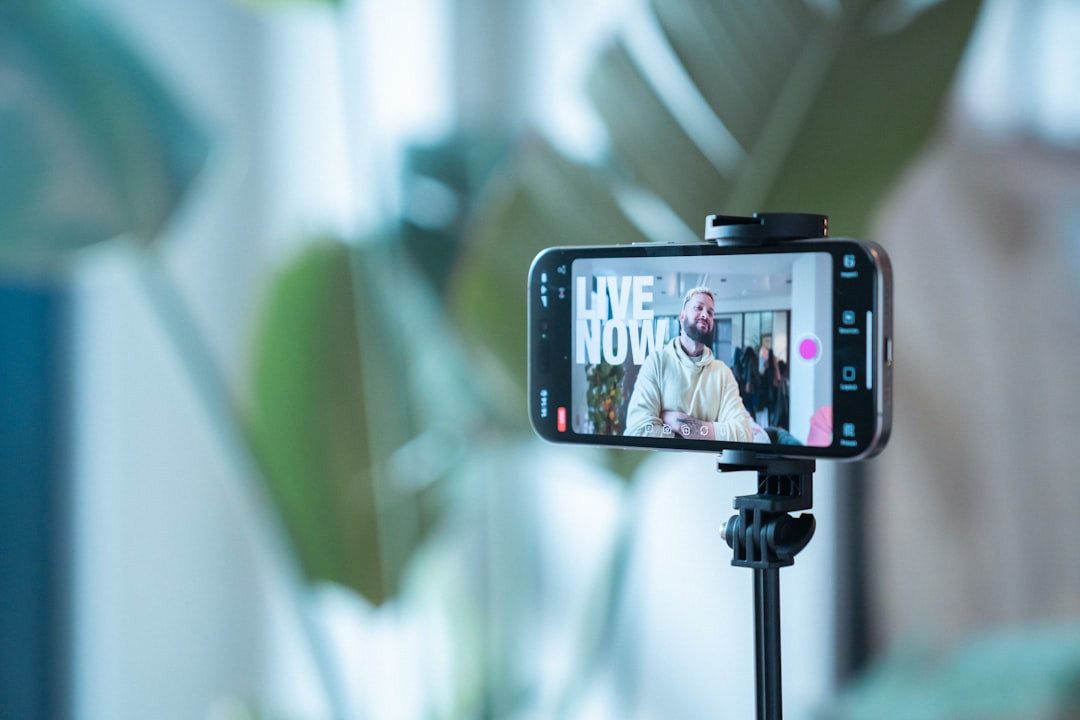 Business owner recording short-form social media video with a smartphone